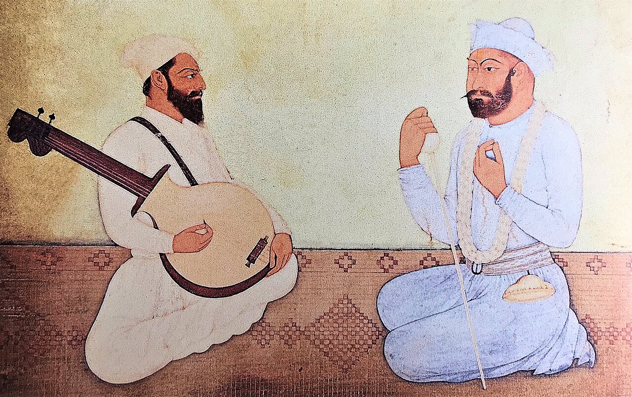 A painting of Guru Nanak seated beneath a tree with Bhai Mardana playing the rabab.